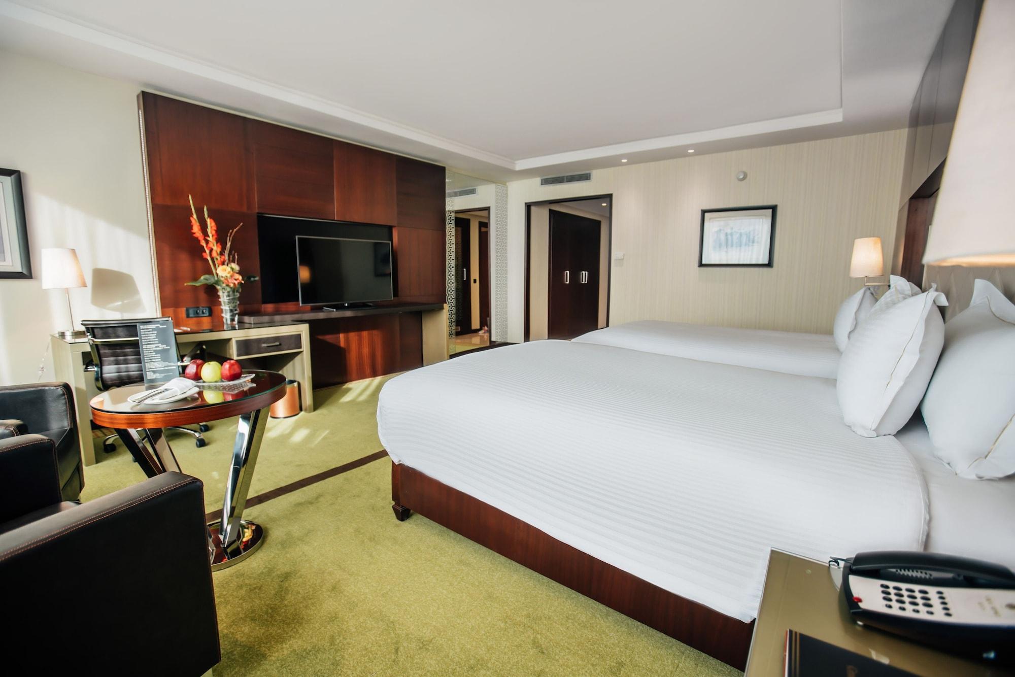 Grand Mogador City Center Casablanca Exteriör bild A room at the hotel