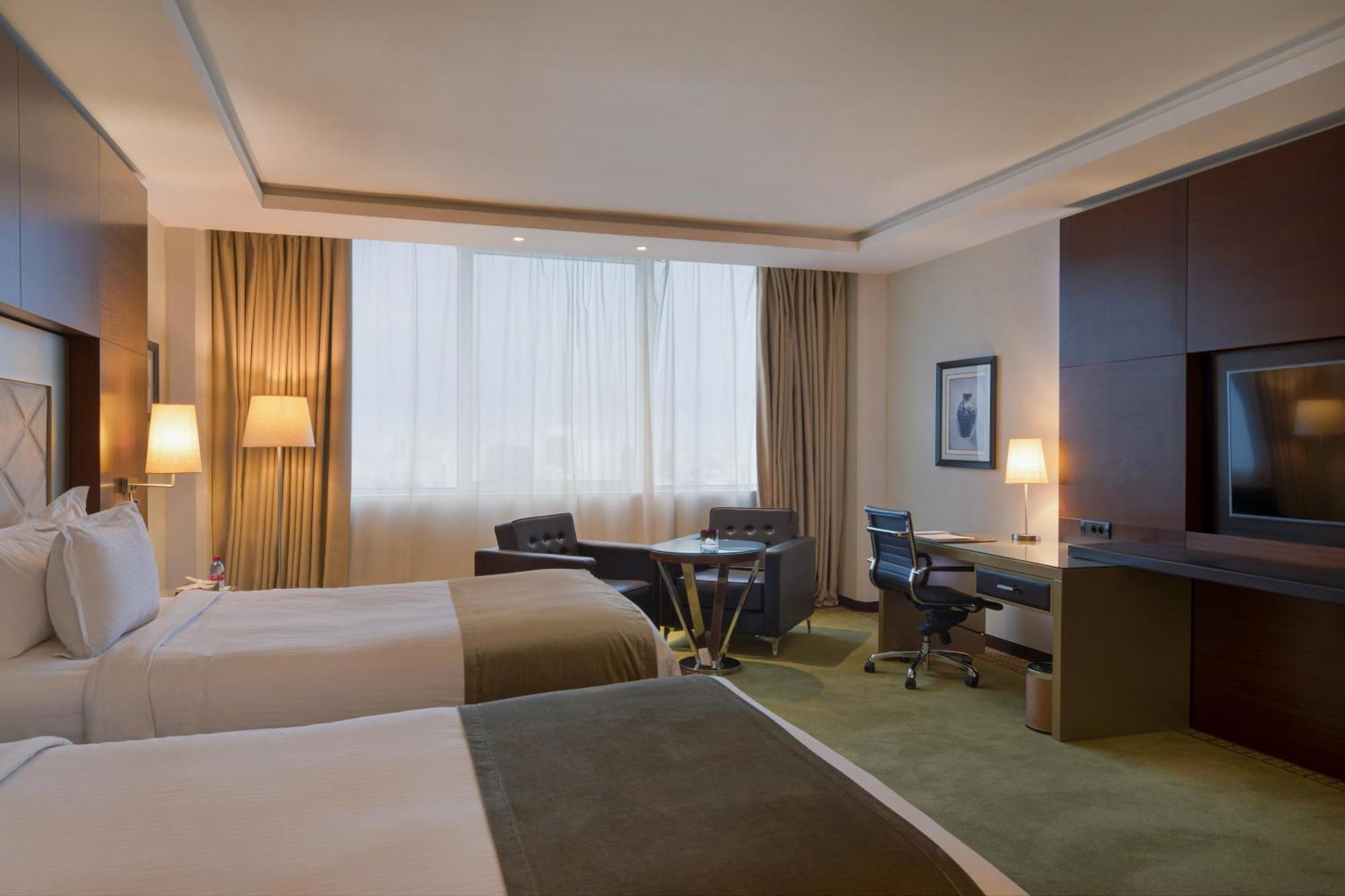 Grand Mogador City Center Casablanca Exteriör bild A room at the hotel